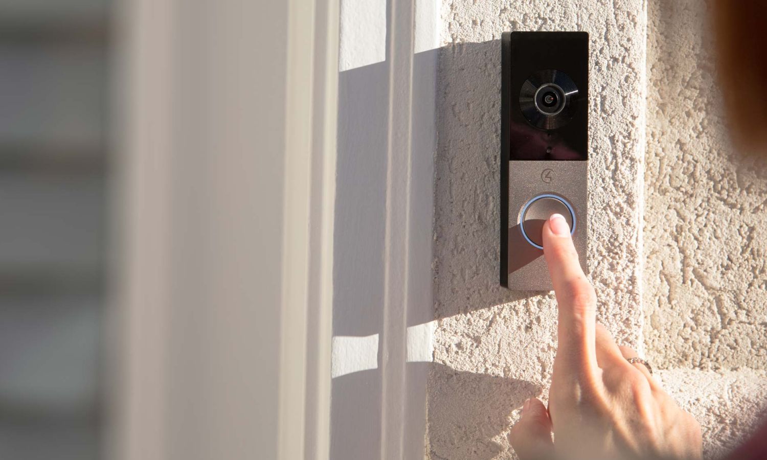 woman pressing chime doorbell Control4