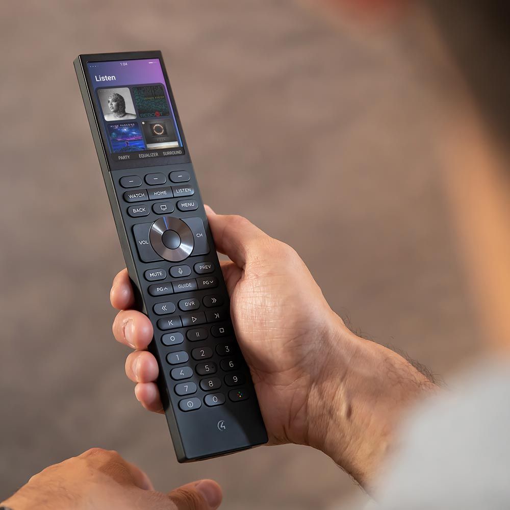 Woman holding silver neeo remote