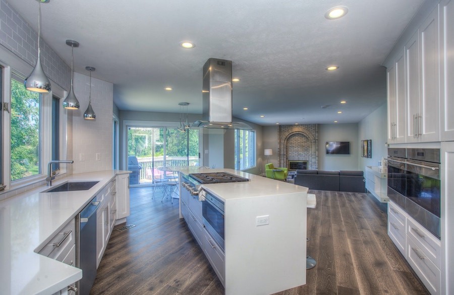 A modern renovated Utah kitchen with upgraded ceiling lighting. 