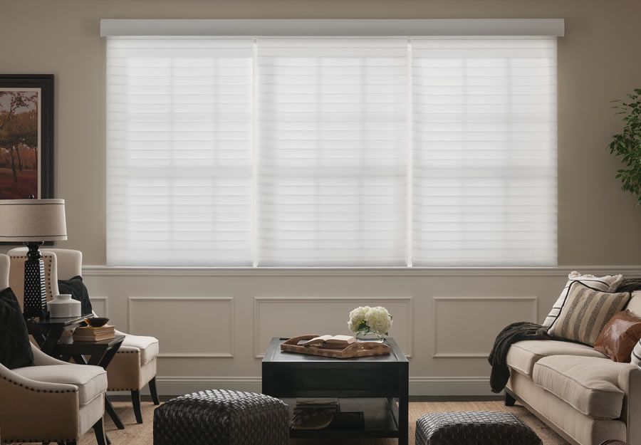 white blinds in a sitting room with Lutron technology